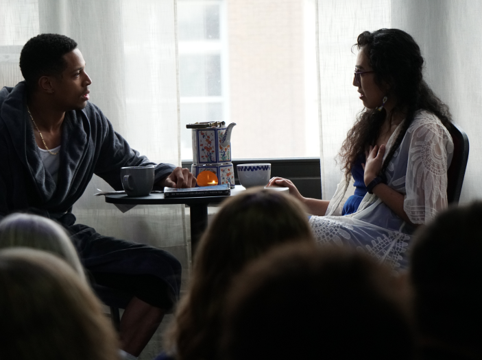 Two students performing a scene